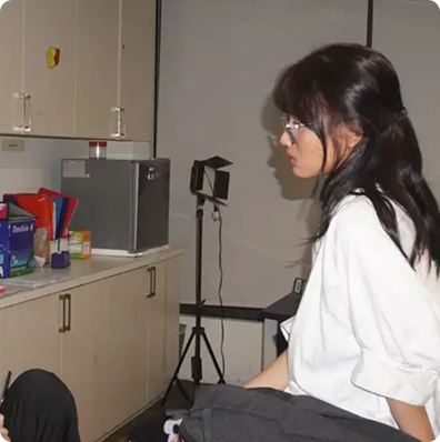 Operating a camera during a university video production